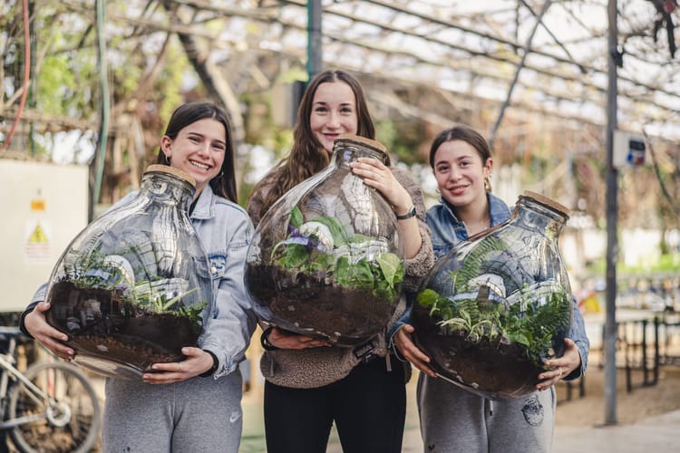 Women holding plants