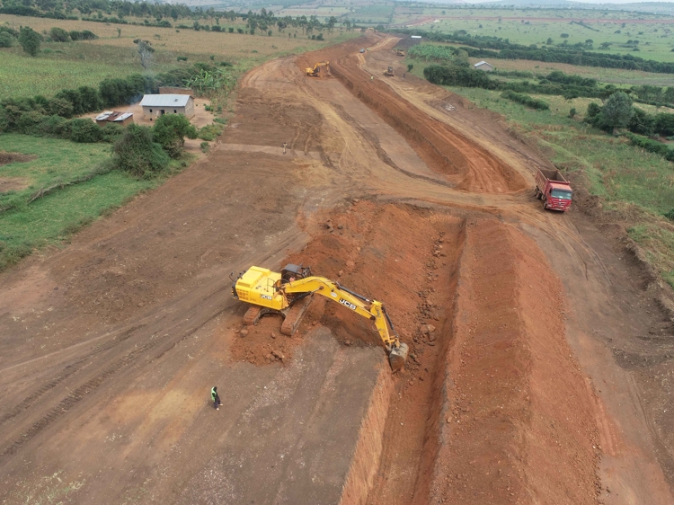 Tractor digging canal for irrigation in Rwanda